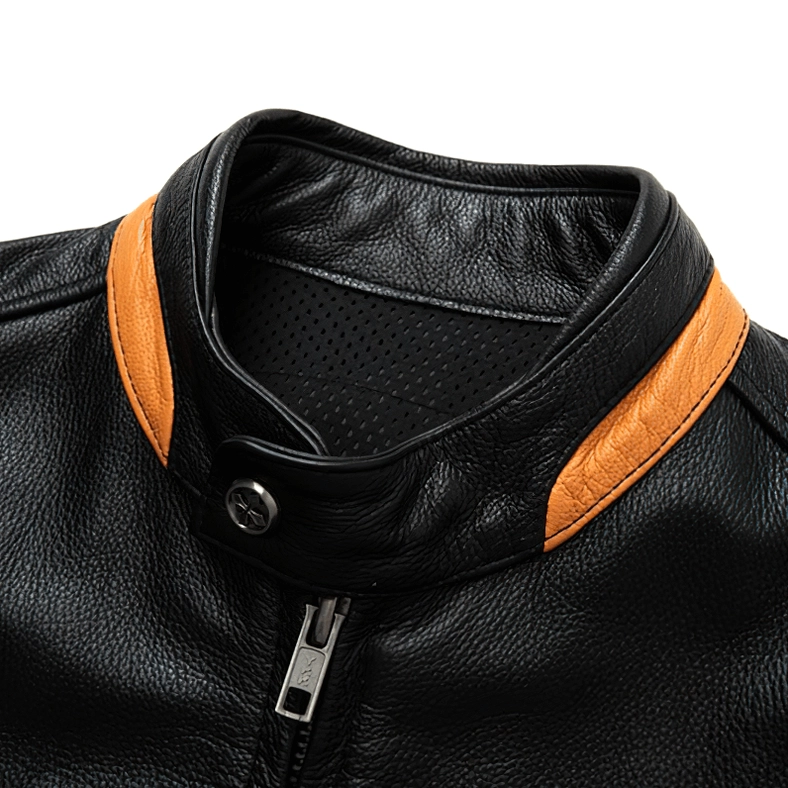 Close-up of black leather jacket stand collar with orange trim and metal snap button detail