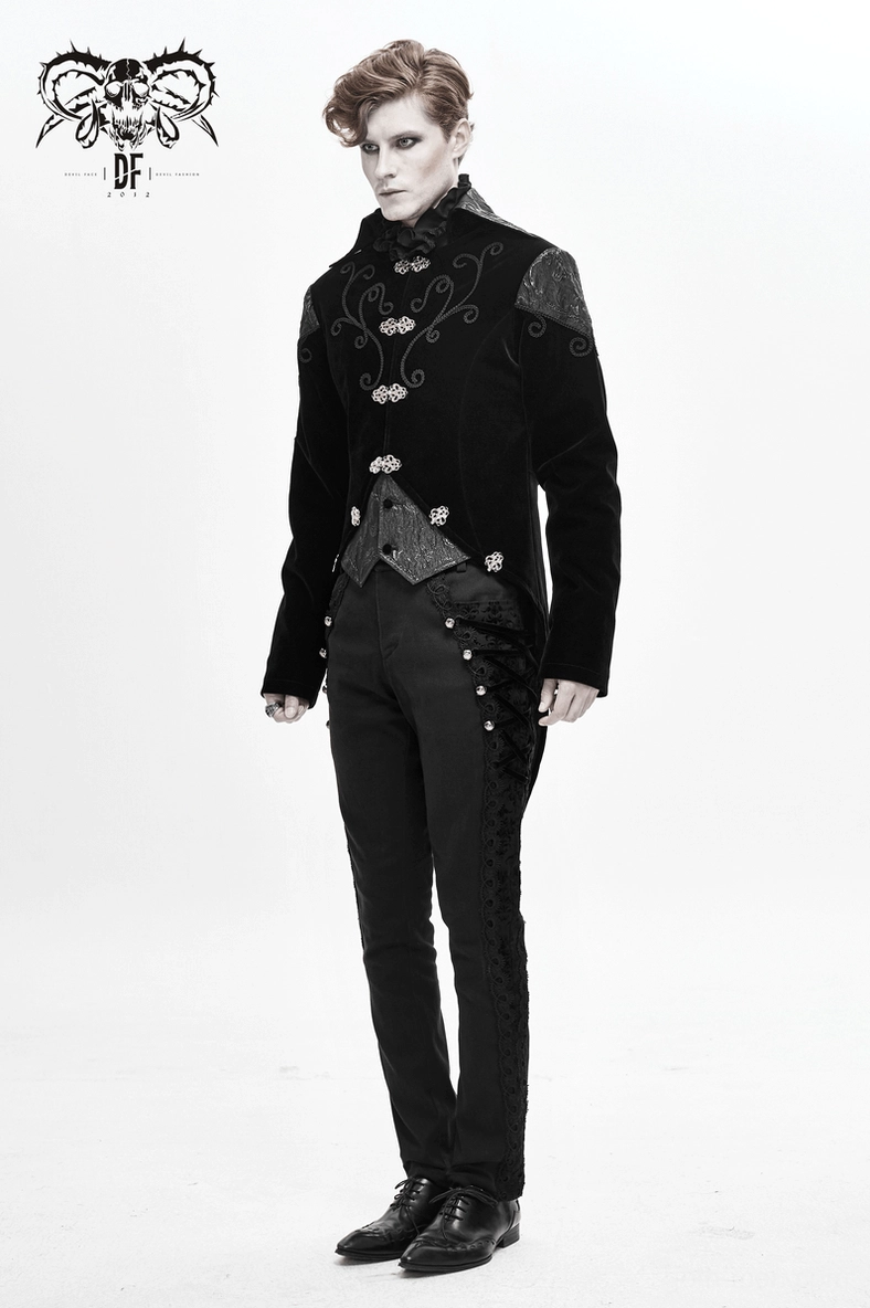 Black velvet steampunk coat waist detail close-up showing metal buttons and decorative embroidered panel