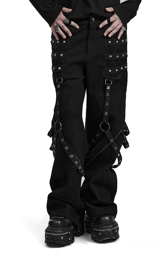 Black studded mesh gothic wide-leg trousers front view with detachable harness straps on male model