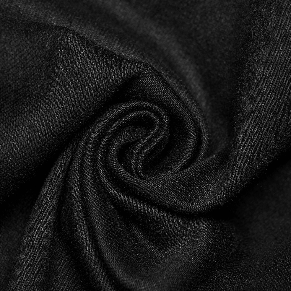 Detailed view of studded waist hardware and decorative loops on slim-fit black gothic denim