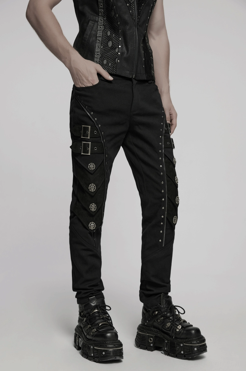 Black pants tactical buckle detail showing rivet trim and armor aesthetic on leg panel