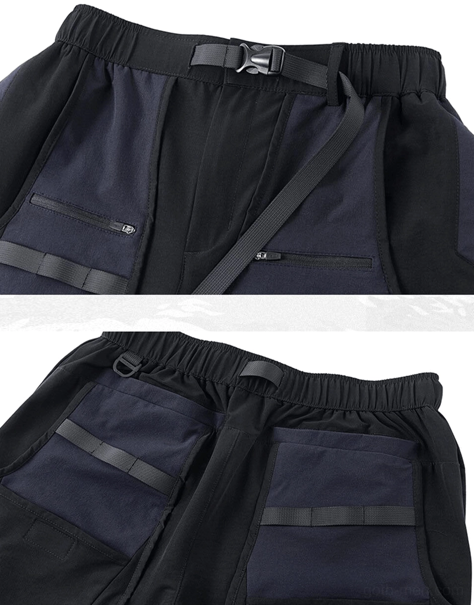 Tactical shorts waist detail - adjustable buckle belt system and side zipper pocket closeup