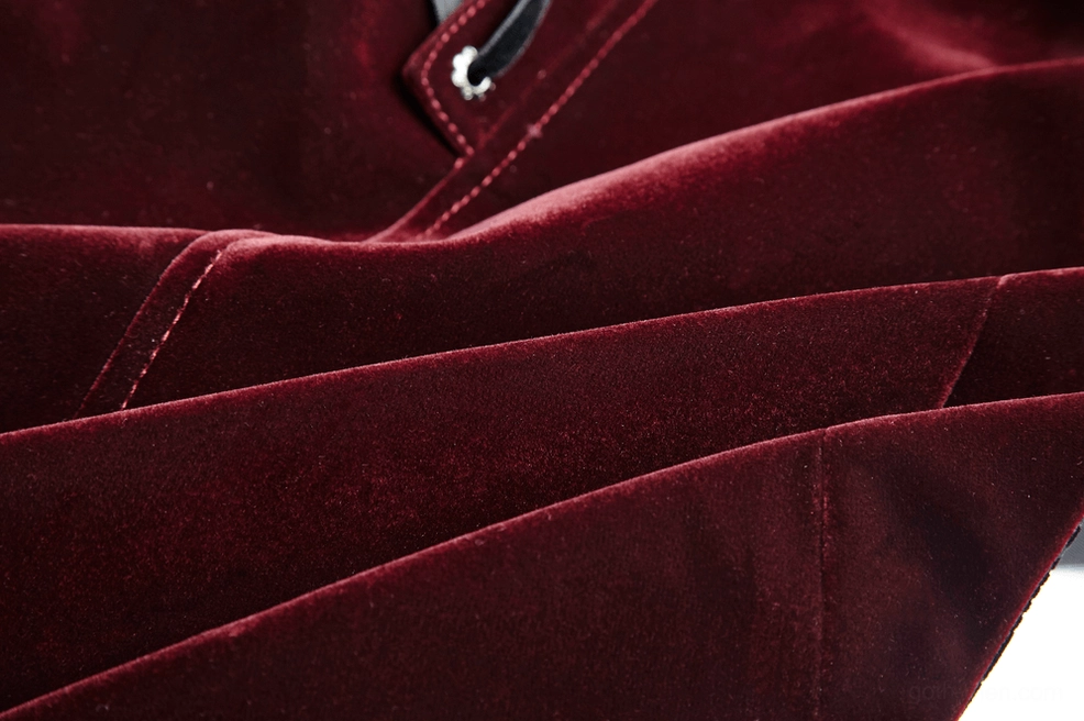 Wine red gothic tailcoat jacket close-up showing fabric quality, embroidery work, and ornate button details