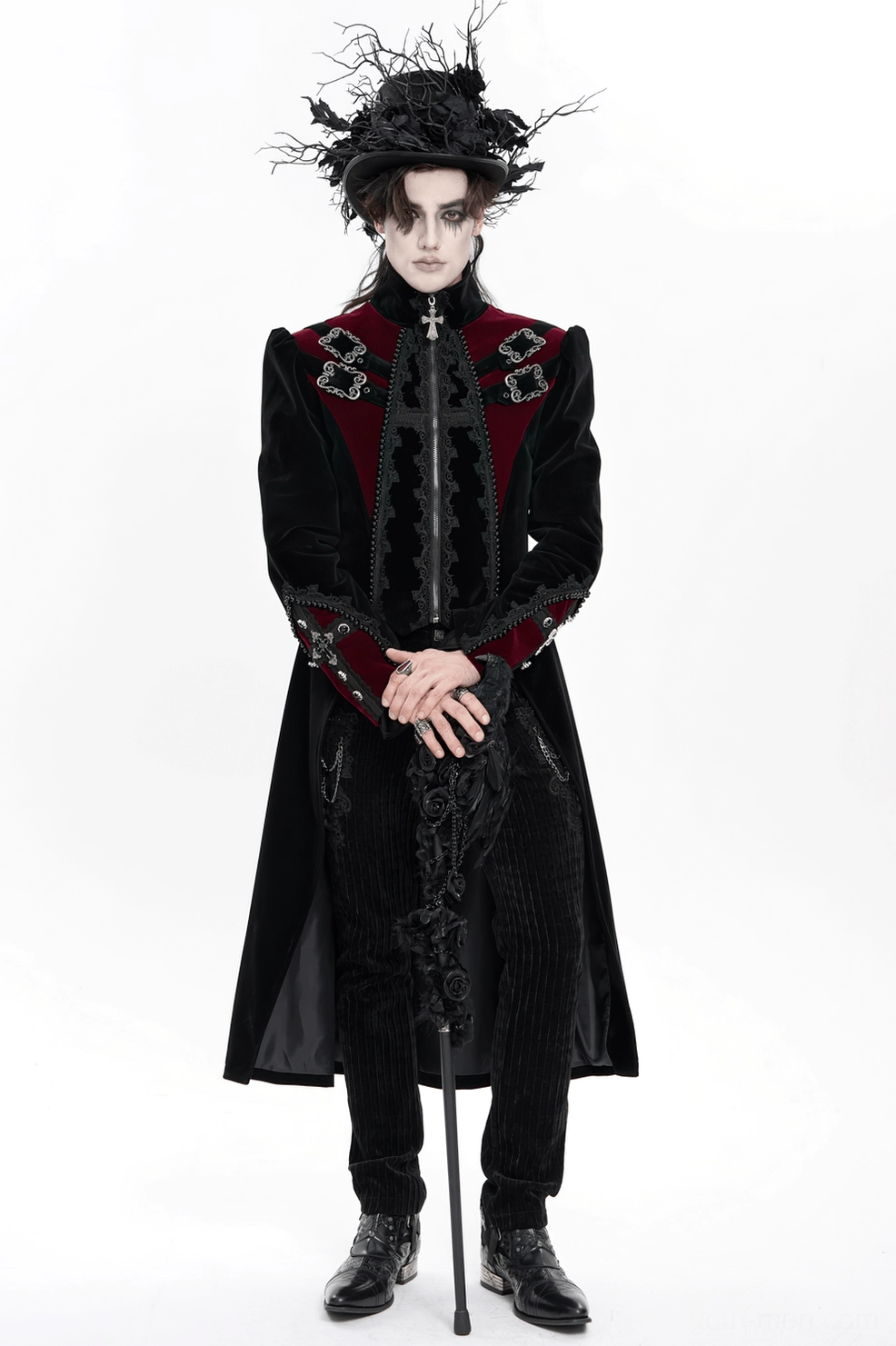 Full-length profile shot of black gothic tailcoat showing dramatic long back train and structured aristocratic silhouette