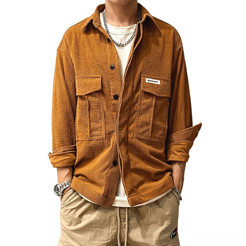 Tan brown waffle cord oversized gothic cargo shirt on male model with rolled sleeves, showing dual cargo pockets and relaxed fit characteristic of alternative goth menswear