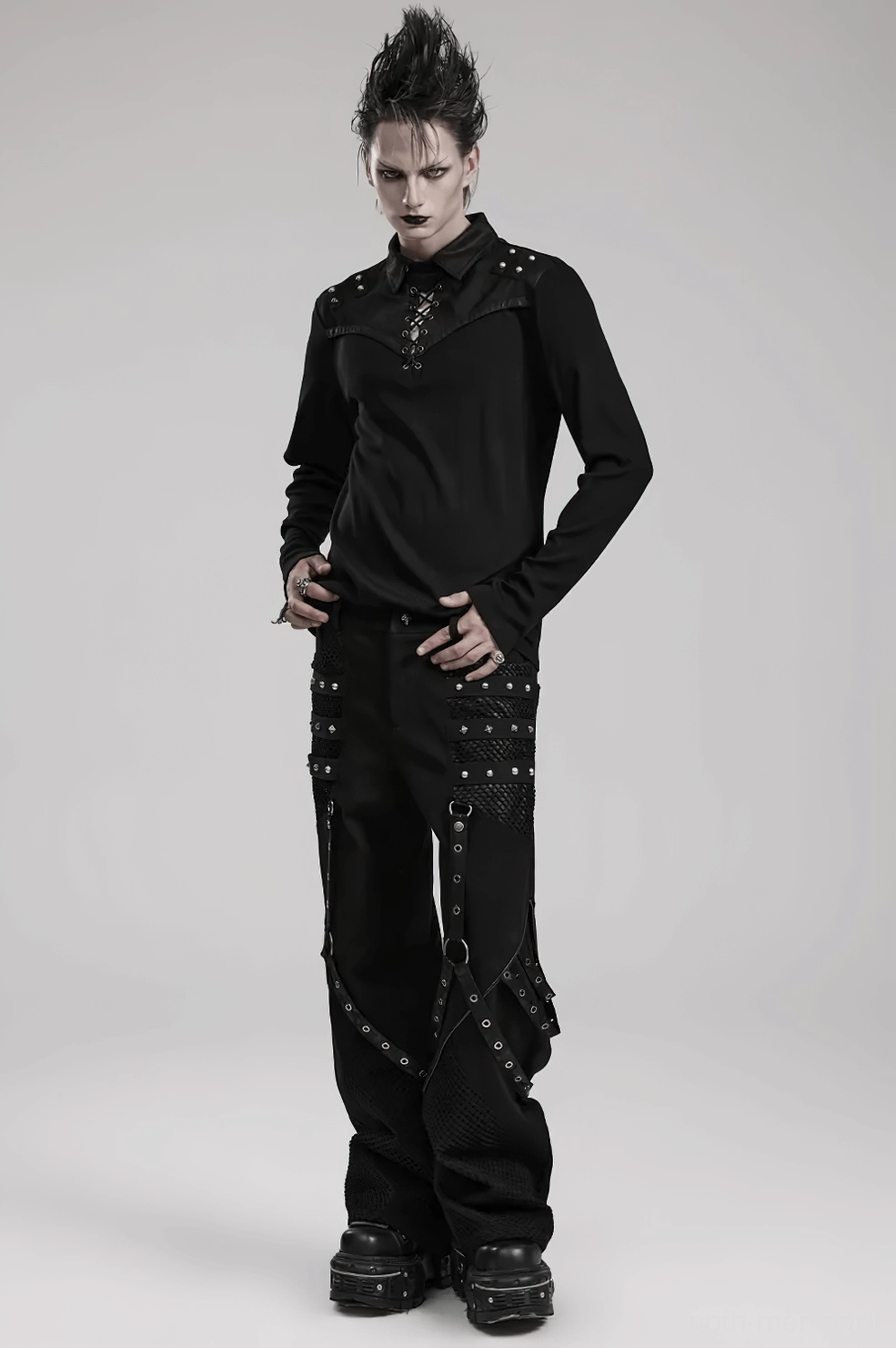 Thigh area close-up showing quilted mesh panels, crackled faux leather, and rivet detailing