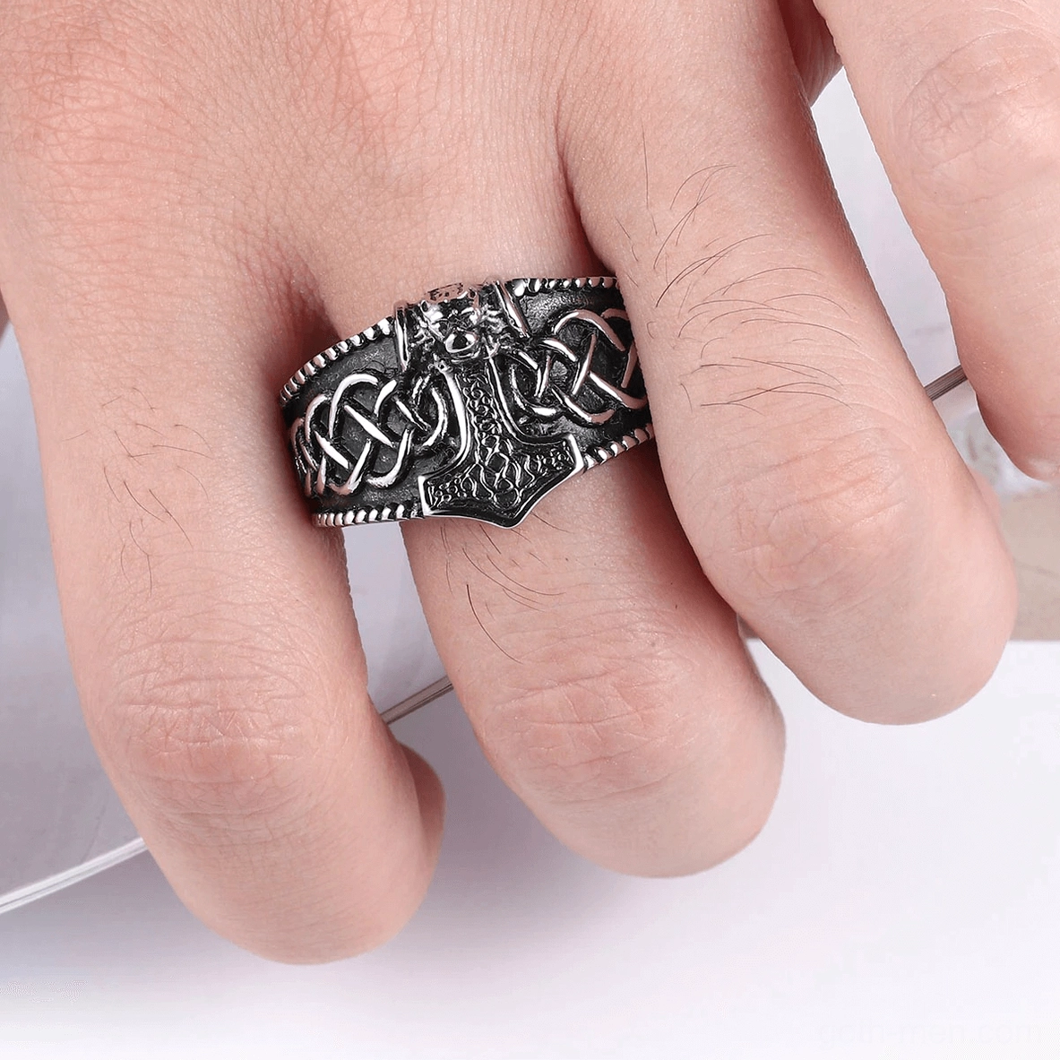 Vintage silver-black Thor's hammer gothic ring detailed view highlighting patina and Celtic knotwork