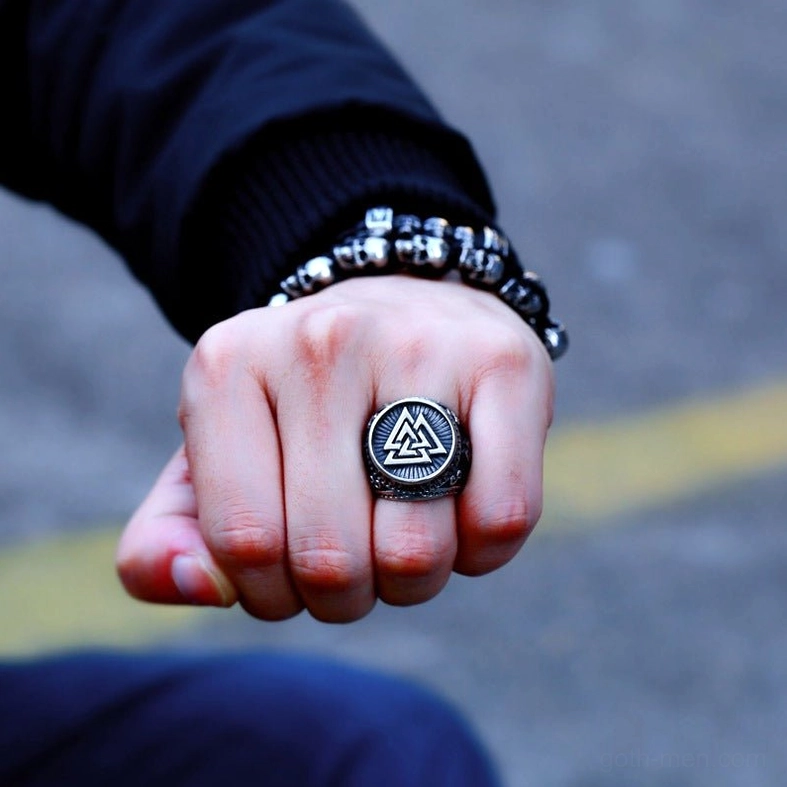 Nordic valknut amulet ring front-three-quarter view with polished finish and engraved ornamental details