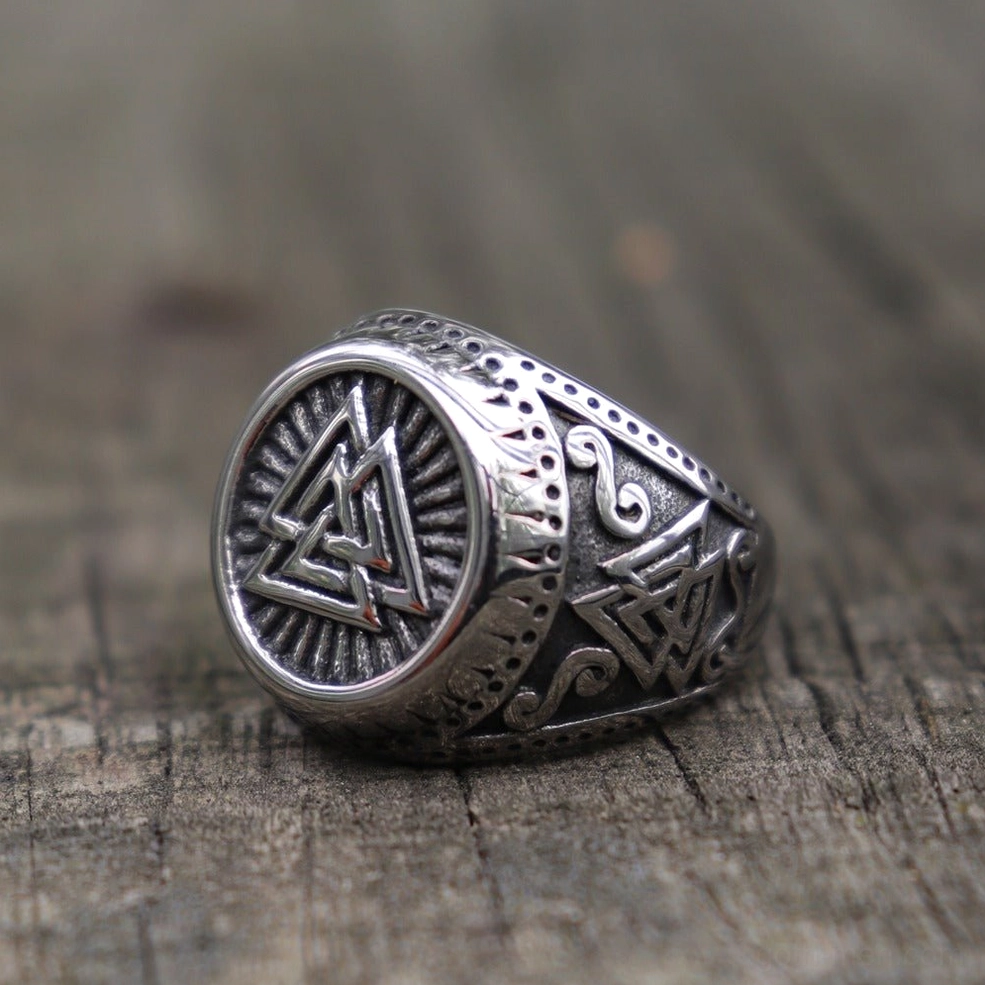 Valknut ring close-up detail view showcasing fine engraving and metalwork on Norse symbol face