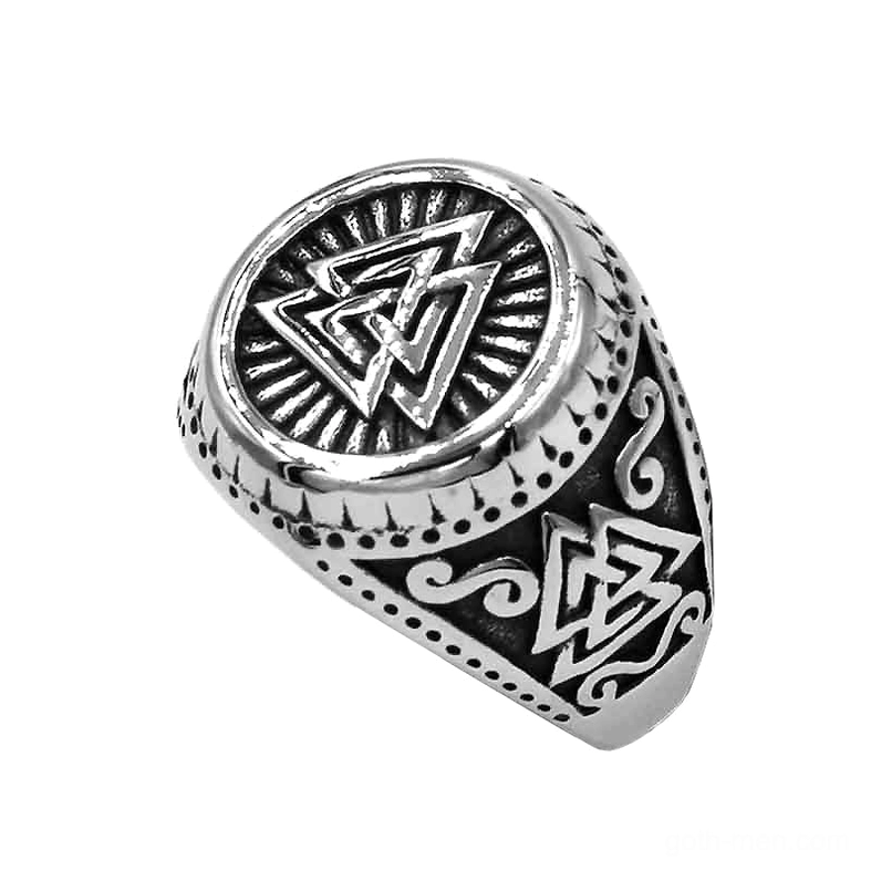 Valknut signet ring top view displaying radiating sunburst pattern beneath Norse symbol with scroll engraved band details