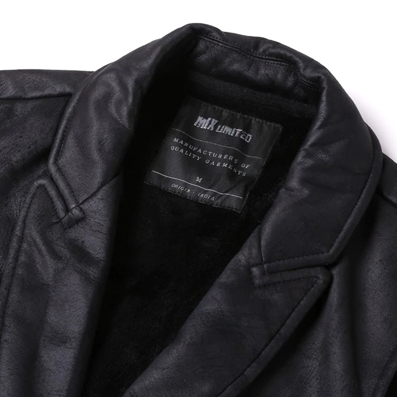 Black suede waistcoat close-up detail of notched lapel collar and brand label