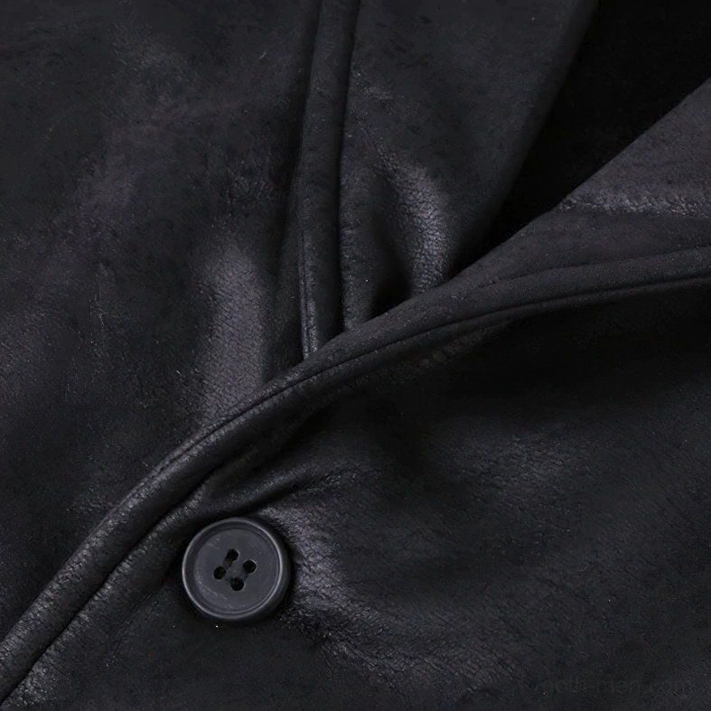 Suede waistcoat fabric texture close-up showing tailored stitching and matte suede material