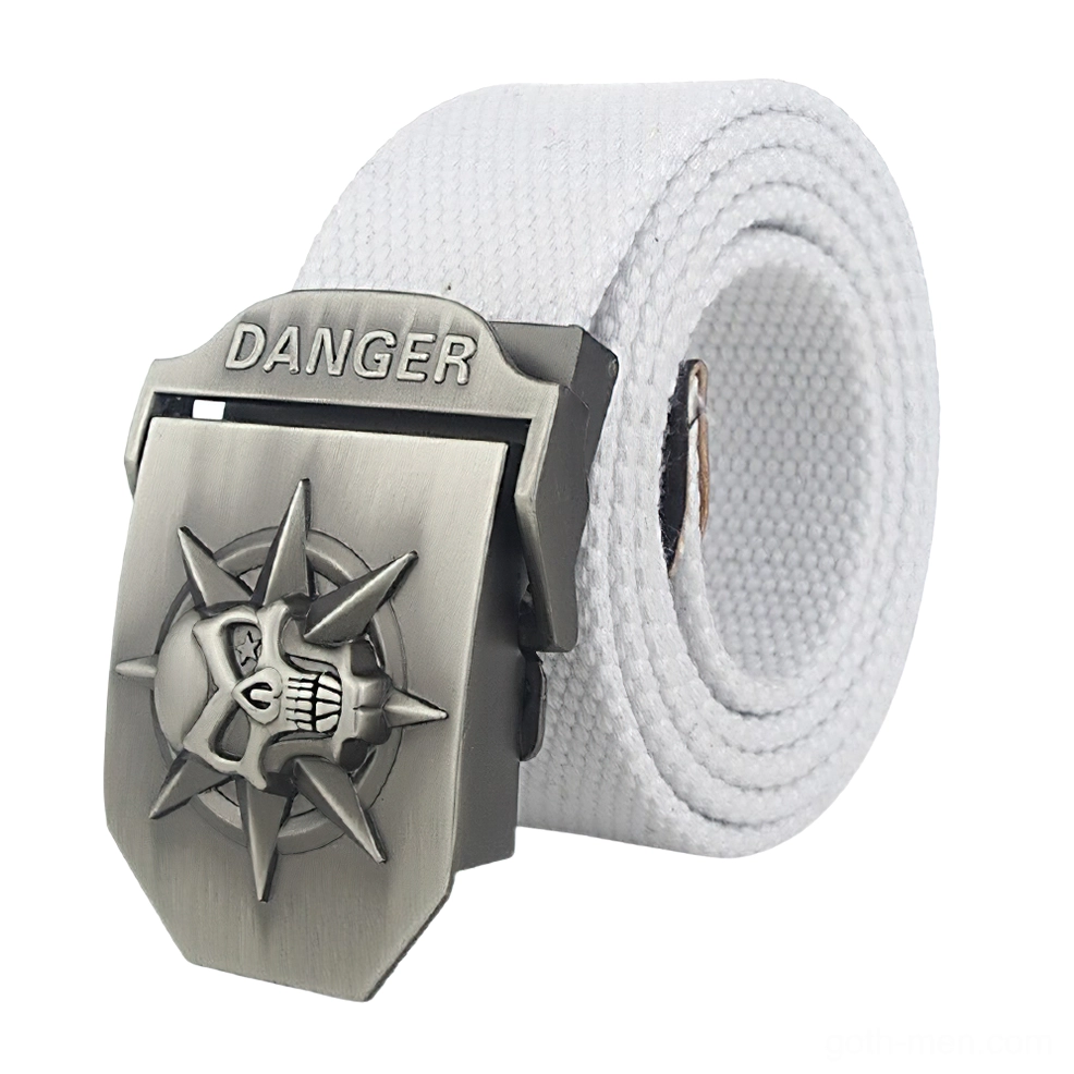 White canvas gothic belt with silver spiked skull DANGER buckle, front three-quarter photography