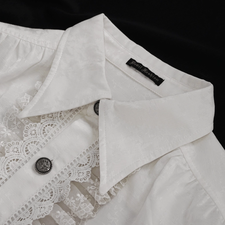 Close-up detail of white gothic shirt collar showing vintage metal buttons, brand construction, delicate lace trim, and neck construction on dark background