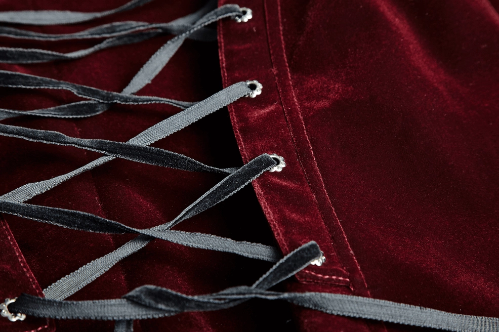 Wine red gothic tailcoat jacket on model displaying rear view with lace-up corset back and split tail design