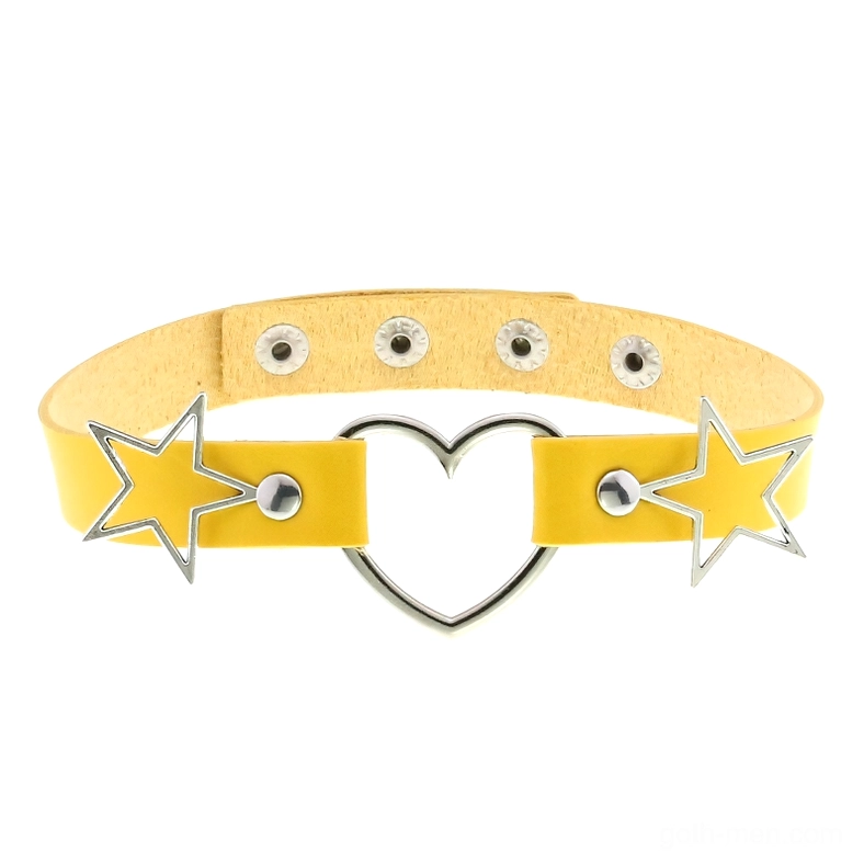 Yellow PU leather choker with silver metal heart and star embellishments, flat lay product display for bold gothic jewelry accessories